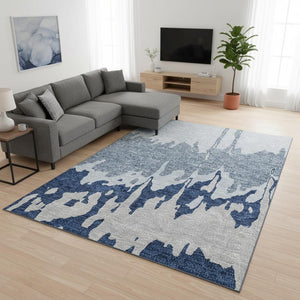 HomeRoots 10' X 14' Sky Blue Beige Abstract Area Rug - Washable, UV Protected, Stain Resistant for Homes 676158