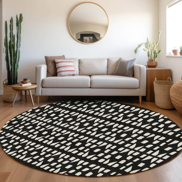 HomeRoots 8' Washable Black and Ivory Geometric Round Rug with UV Protection for Modern Living Spaces 676251