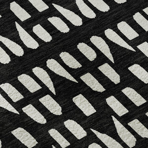 HomeRoots 8' Washable Black and Ivory Geometric Round Rug with UV Protection for Modern Living Spaces 676251