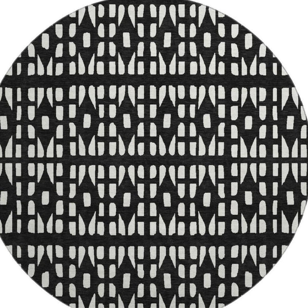 HomeRoots 8' Washable Black and Ivory Geometric Round Rug with UV Protection for Modern Living Spaces 676251