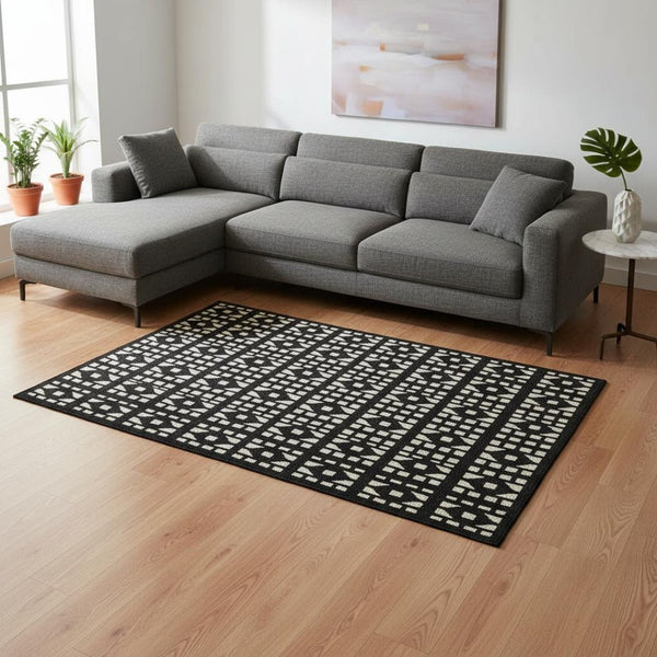 HomeRoots 9' X 12' Black and Ivory Geometric Area Rug – Washable, Durable, UV-Protected for Busy Homes! 676253