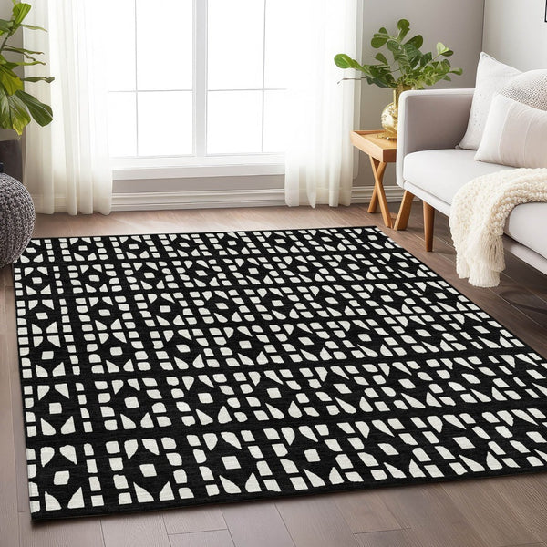 HomeRoots 9' X 12' Black and Ivory Geometric Area Rug – Washable, Durable, UV-Protected for Busy Homes! 676253