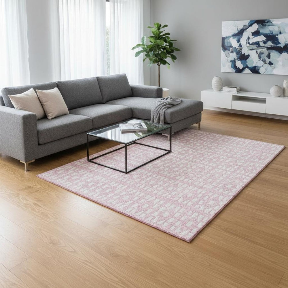 HomeRoots 10' X 14' Pink and Ivory Geometric Area Rug – Washable, UV Protected, Perfect for Family Spaces! 676290