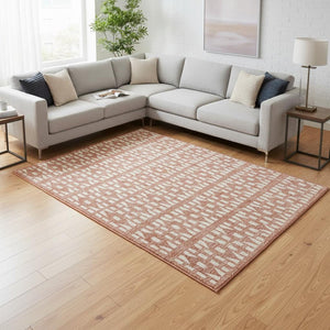 HomeRoots 9' X 12' Salmon and Ivory Geometric Area Rug - Washable, Stain Resistant, UV Protection for Durability 676295