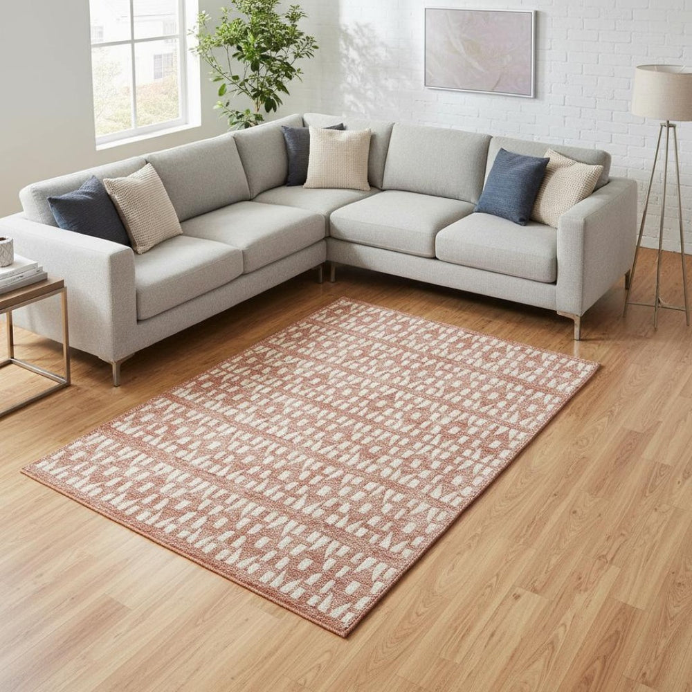 HomeRoots 10' Salmon & Ivory Geometric Washable Area Rug – UV Protected, Stain Resistant, Perfect for Busy Homes 676296