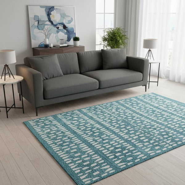 HomeRoots 5' X 8' Teal and Ivory Geometric Area Rug - Washable, UV Protected, Durable & Stylish for Any Room! 676298