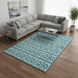 HomeRoots 10' X 14' Teal and Ivory Geometric Area Rug - Washable, UV Protected, Durable for High-Traffic Spaces 676302