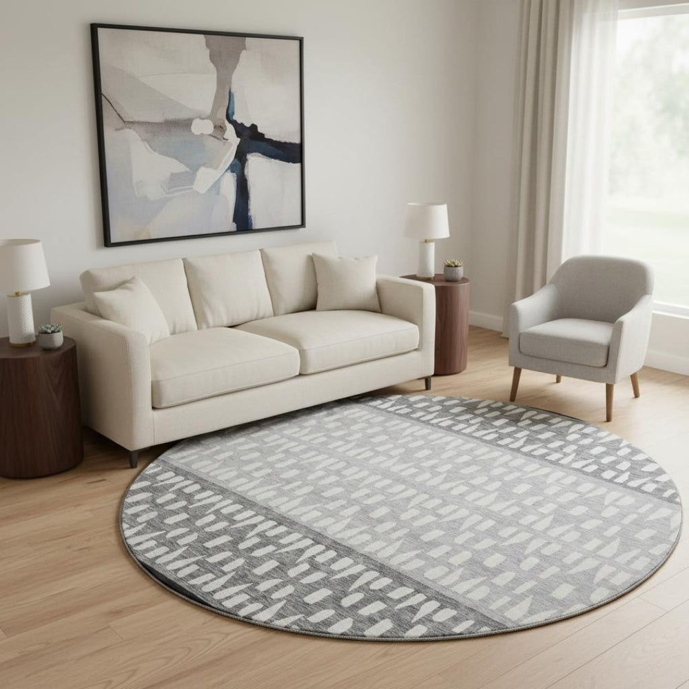 HomeRoots 8' Geometric Round Rug in Black, Gray, and Ivory – Washable, UV Protected, Perfect for High-Traffic Areas 676311