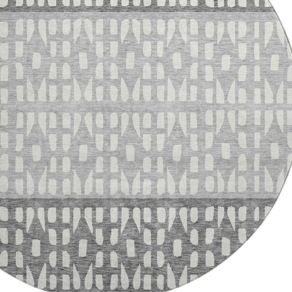 HomeRoots 8' Geometric Round Rug in Black, Gray, and Ivory – Washable, UV Protected, Perfect for High-Traffic Areas 676311