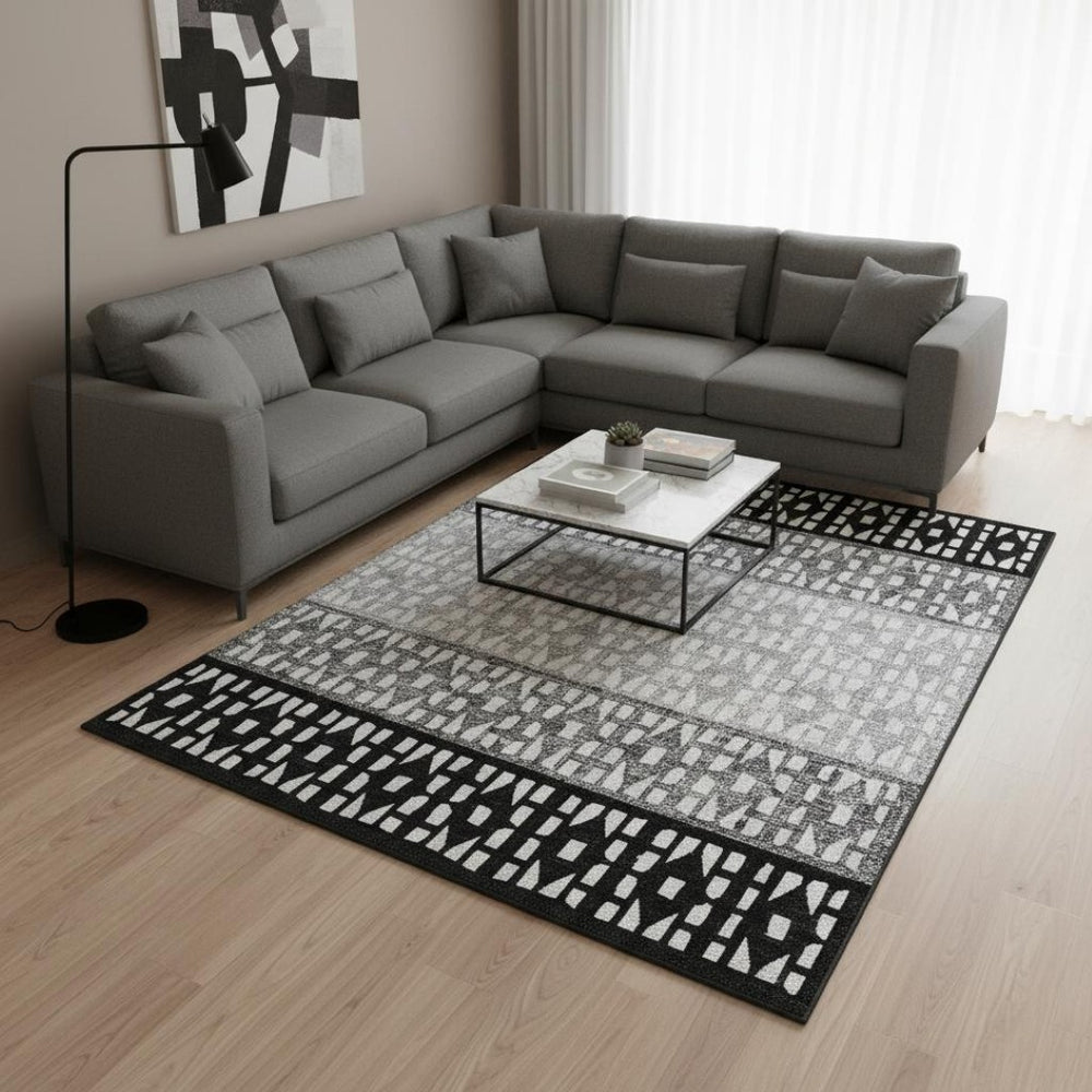 HomeRoots 9' X 12' Stylish Washable Area Rug in Black, Gray & Ivory - Durable, Stain-Resistant, UV Protected! 676313