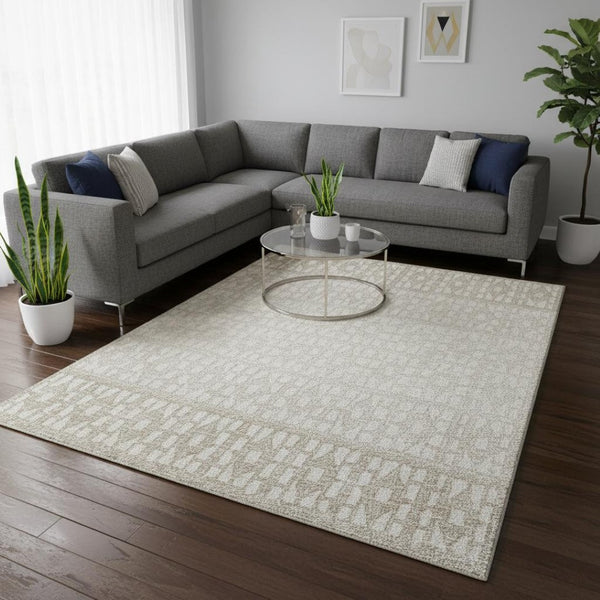 HomeRoots 10' X 14' Ivory & Beige Geometric Washable Area Rug - Durable, UV-Protected for Stylish Living Spaces 676350