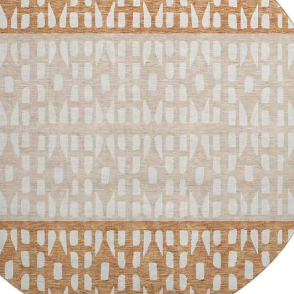 HomeRoots 8' Washable Round Rug in Rust and Ivory with Geometric Design, UV Protection & Stain Resistance 676353
