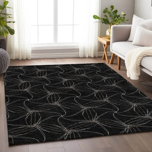 HomeRoots 5' X 8' Black And Ivory Geometric Area Rug – Washable, UV Protected, Ideal for Modern Homes & Families 676550