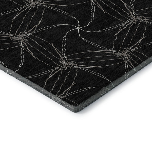 HomeRoots 5' X 8' Black And Ivory Geometric Area Rug – Washable, UV Protected, Ideal for Modern Homes & Families 676550