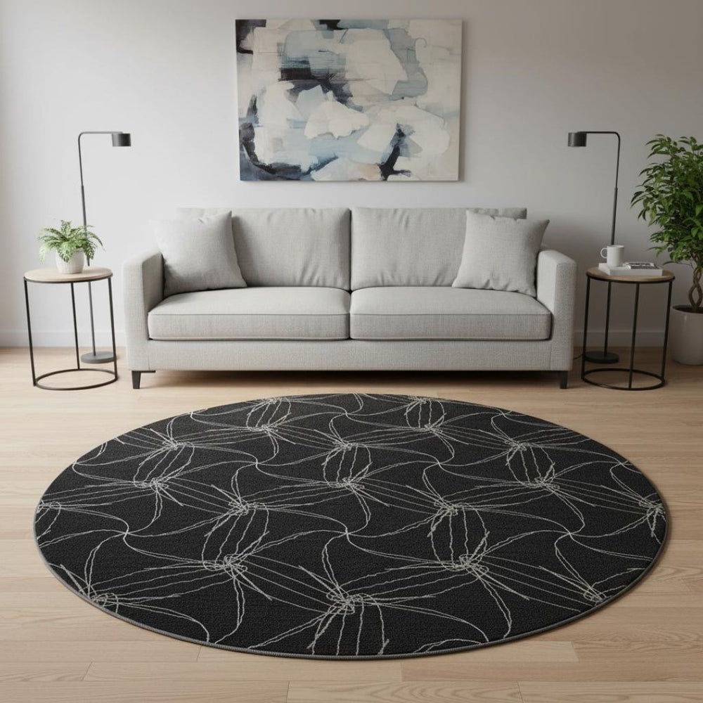 HomeRoots 8' Black And Ivory Geometric Round Rug – Washable, UV-Protected, Stain-Resistant, Durable Design 676551