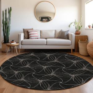 HomeRoots 8' Black And Ivory Geometric Round Rug – Washable, UV-Protected, Stain-Resistant, Durable Design 676551