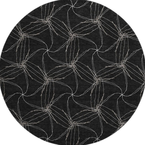 HomeRoots 8' Black And Ivory Geometric Round Rug – Washable, UV-Protected, Stain-Resistant, Durable Design 676551