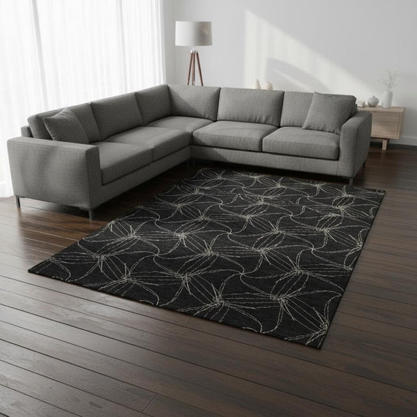 HomeRoots 9' X 12' Modern Black and Ivory Geometric Washable Area Rug with UV Protection for Family Spaces 676553