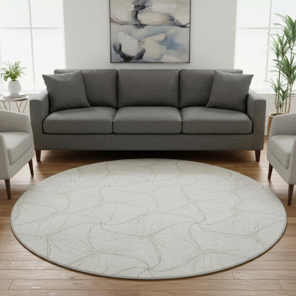 HomeRoots 8' Ivory and Gray Geometric Round Rug - Washable, UV Protected, Perfect for High-Traffic Areas! 676569
