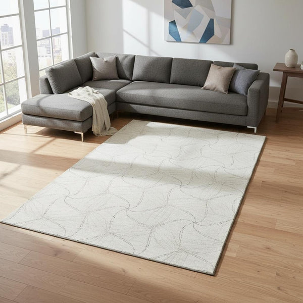 HomeRoots 8' X 10' Ivory and Gray Geometric Area Rug - Washable, UV Protected, Durable for High-Traffic Spaces 676570