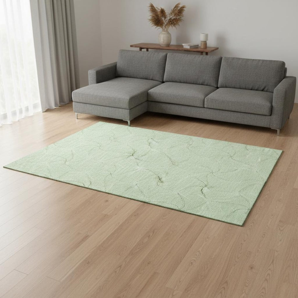 HomeRoots 10' X 14' Mint Green Geometric Area Rug - Washable, UV Protected & Stain Resistant for Modern Spaces 676578