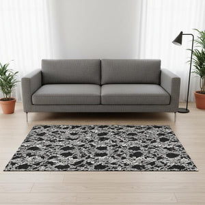 HomeRoots 5' X 8' Abstract Washable Area Rug in Black, Gray & Ivory - UV Protected, Modern Design for High-Traffic Spaces 676616