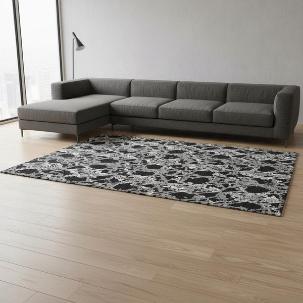 HomeRoots 10' X 14' Oversized Abstract Area Rug in Black, Gray & Ivory - Washable, UV Protected & Durable Design 676620