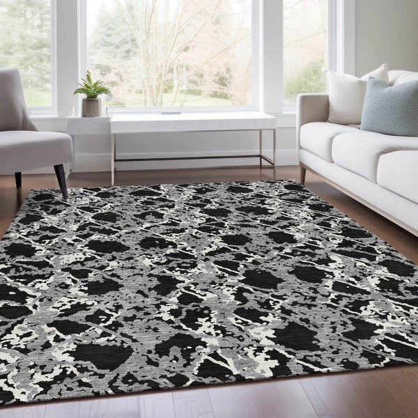 HomeRoots 10' X 14' Oversized Abstract Area Rug in Black, Gray & Ivory - Washable, UV Protected & Durable Design 676620