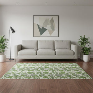 HomeRoots 5' X 8' Abstract Washable Area Rug in Green, Gray & Ivory - UV Protected, Ideal for High Traffic Areas 676652