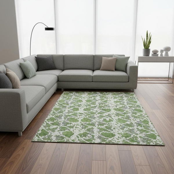HomeRoots 9' X 12' Abstract Washable Area Rug in Green, Gray & Ivory - Durable, UV-Protected & Easy Care! 676655