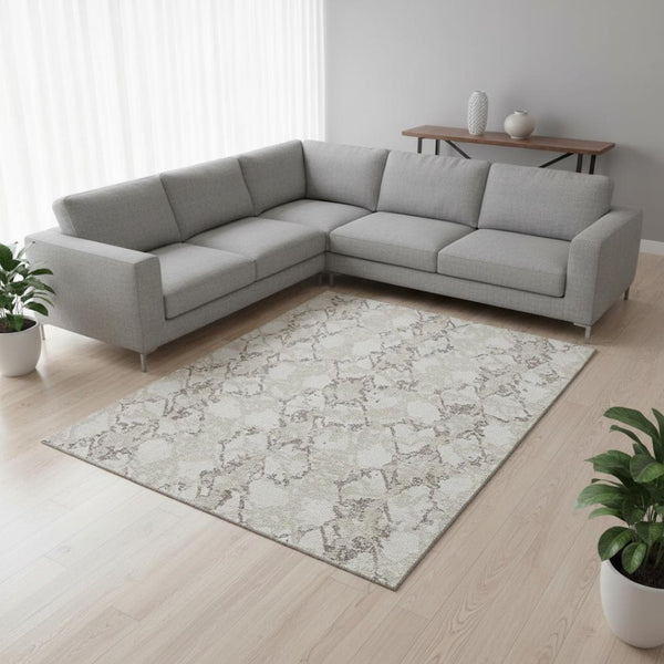 HomeRoots 10' X 14' Abstract Ivory Taupe Beige Area Rug - Durable, Washable, UV-Protected for Family Spaces 676662