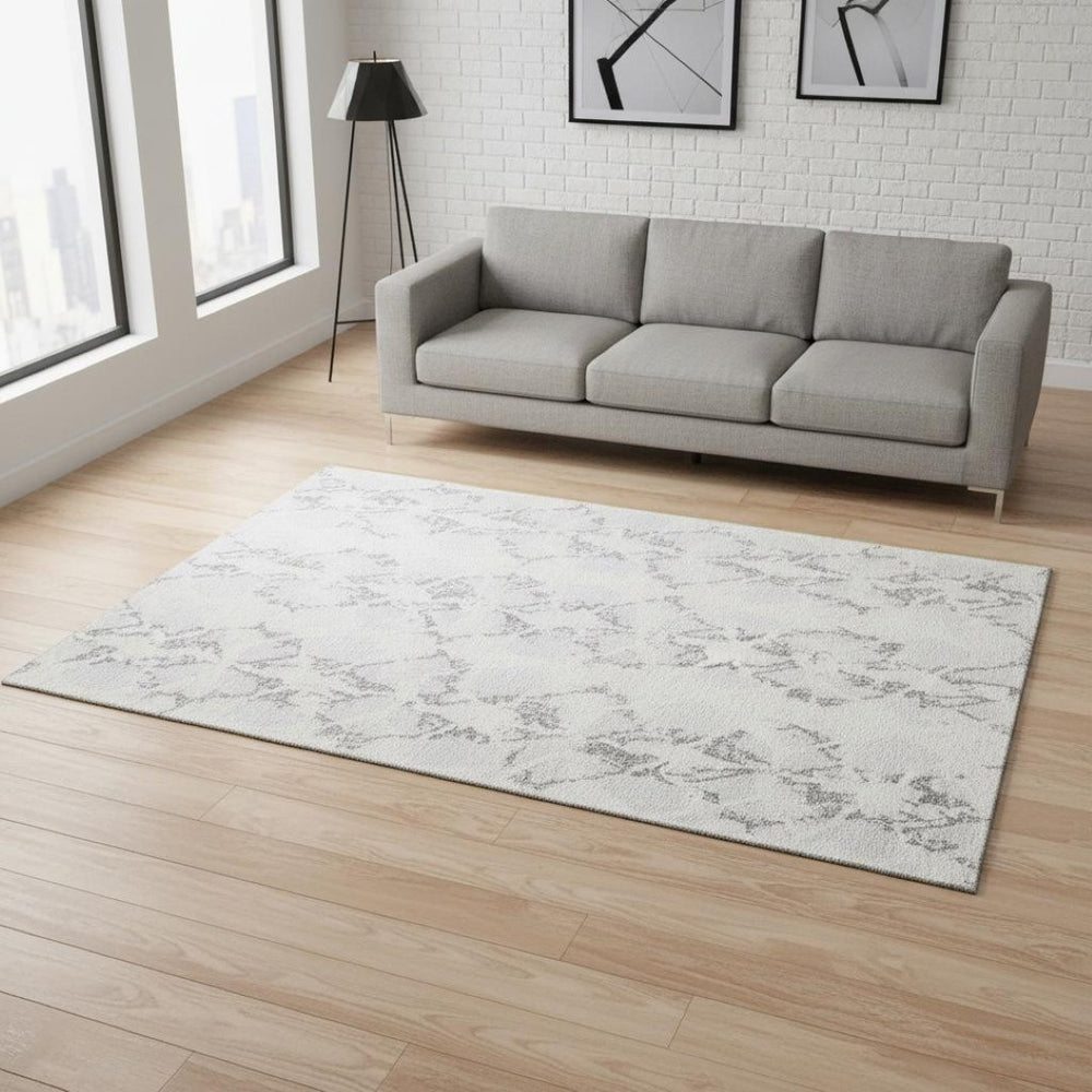 HomeRoots 5' X 8' Silver Gray and Ivory Abstract Area Rug – Washable, UV Protected, Ideal for Modern Living Spaces 676670