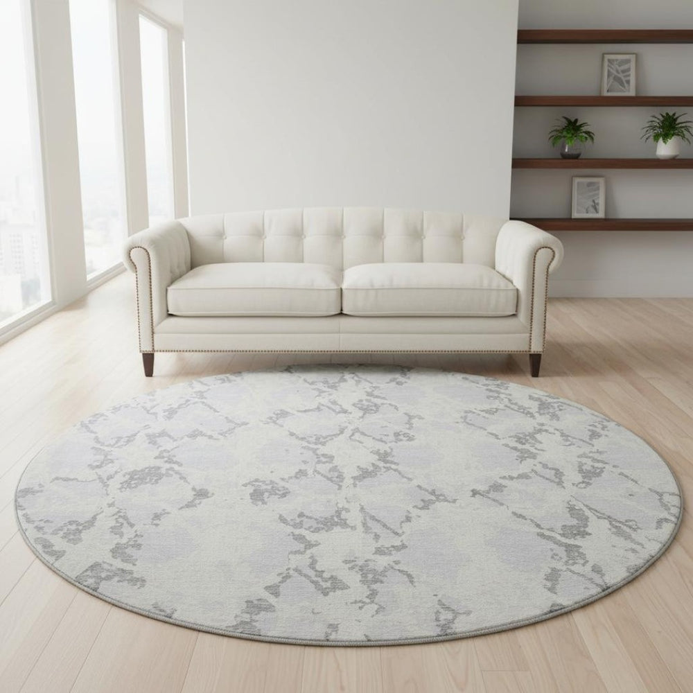 HomeRoots 8' Stylish Silver Gray and Ivory Abstract Washable Round Rug with UV Protection for High-Traffic Areas 676671