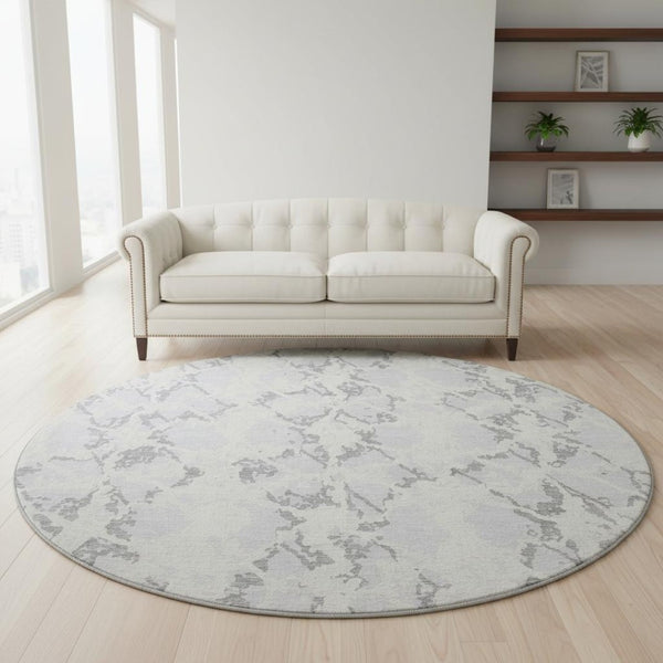 HomeRoots 8' Stylish Silver Gray and Ivory Abstract Washable Round Rug with UV Protection for High-Traffic Areas 676671