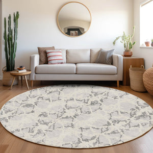 HomeRoots 8' Stylish Silver Gray and Ivory Abstract Washable Round Rug with UV Protection for High-Traffic Areas 676671