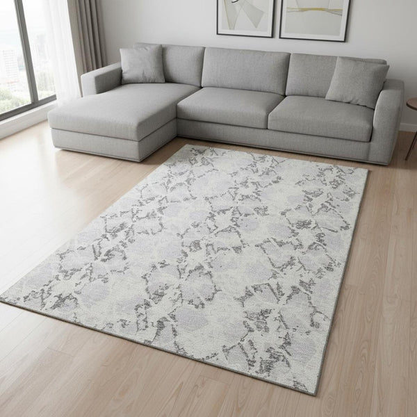HomeRoots 10' Contemporary Silver Gray & Ivory Abstract Washable Area Rug with UV Protection & Style Boost 676674
