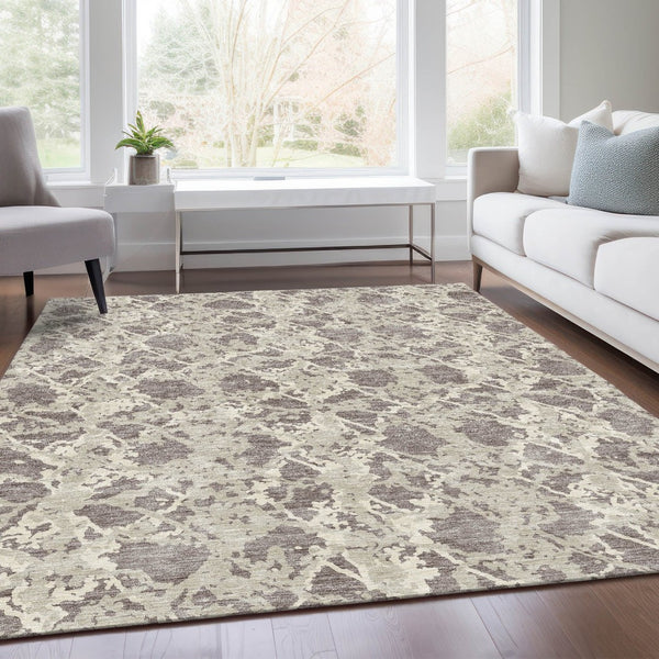 HomeRoots 10' X 14' Washable Taupe Beige Ivory Abstract Area Rug with UV Protection for Modern Living Spaces 676686