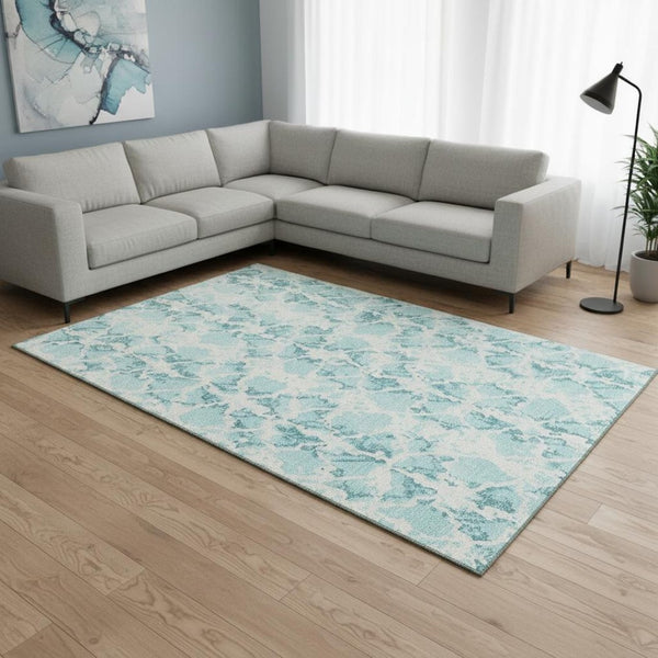 HomeRoots 9' X 12' Teal and Ivory Abstract Washable Area Rug - Durable, UV-Protected, Perfect for High-Traffic Spaces 676691