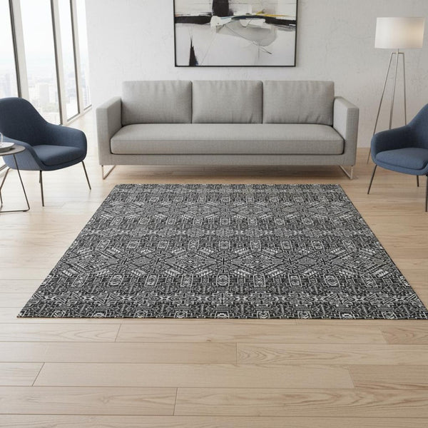 HomeRoots 5' X 8' Black And Ivory Southwestern Area Rug – Washable, UV Protected, Ideal for High-Traffic Spaces 676694