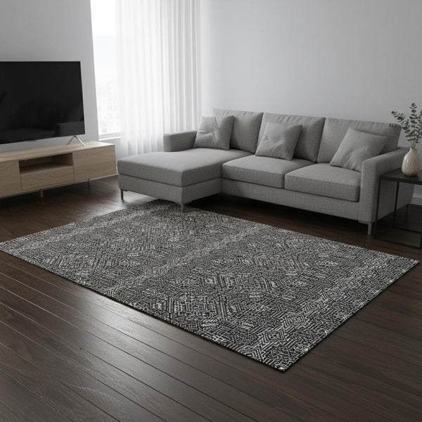 HomeRoots 9' X 12' Black And Ivory Southwestern Area Rug - Durable, Washable, UV-Protected for Family Spaces 676697