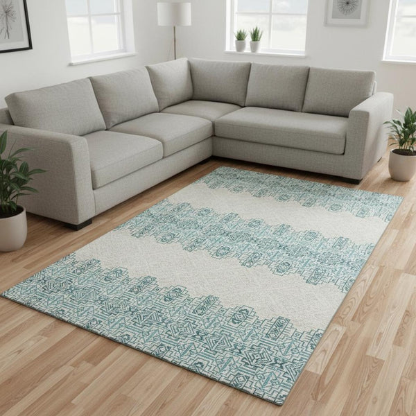 HomeRoots 9' X 12' Teal And Ivory Southwestern Area Rug – Durable, Washable, UV-Protected for Indoor/Outdoor Use 676751