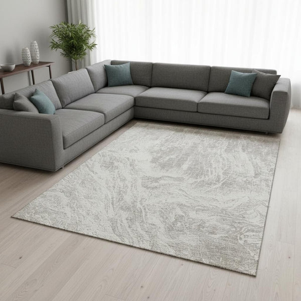 HomeRoots 9' X 12' Abstract Beige and Ivory Area Rug - Washable, UV Protected, Stain-Resistant for High-Traffic Areas 676763