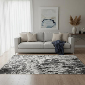 HomeRoots 5' X 8' Black And Ivory Abstract Area Rug - Stylish, Washable, UV-Protected & Perfect for Any Space! 676766