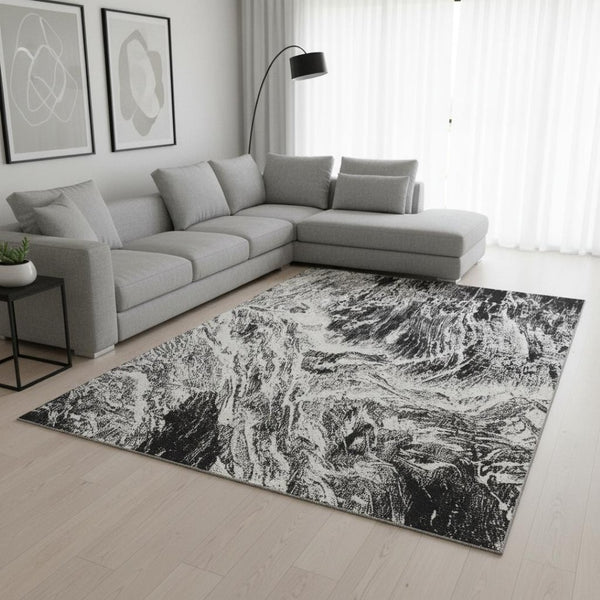 HomeRoots 9' X 12' Black and Ivory Abstract Washable Area Rug – Durable, Stylish, UV-Protected for Every Home 676769