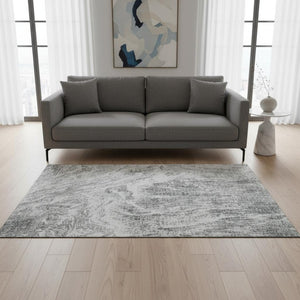 HomeRoots 5' X 8' Contemporary Gray and Ivory Abstract Washable Area Rug with UV Protection for Home Comfort 676778
