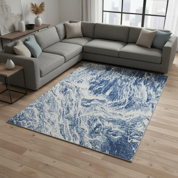 HomeRoots 10' X 14' Navy Blue and Ivory Abstract Area Rug – Washable, Durable, UV-Protected for Modern Spaces 676788