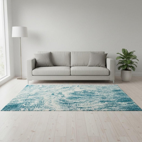HomeRoots 5' X 8' Teal and Ivory Abstract Area Rug - Washable, UV-Protected, Stain-Resistant for High-Traffic Spaces 676802