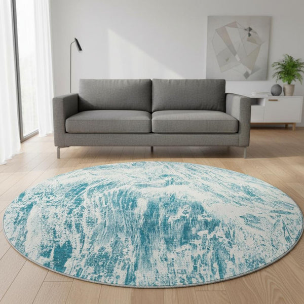 HomeRoots 8' Teal And Ivory Abstract Washable Round Rug - UV Protected, Stain-Resistant, Perfect for High-Traffic Areas 676803