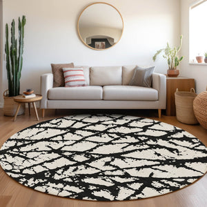 HomeRoots 8' Black And Ivory Abstract Round Rug - Washable, UV Protected, Durable Design for Modern Homes 676809