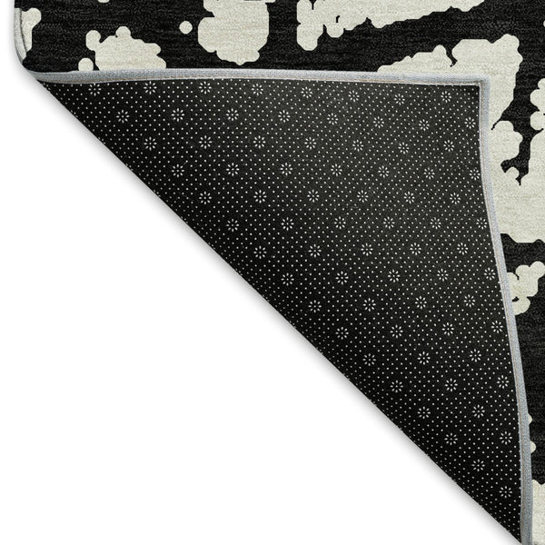 HomeRoots 8' Black And Ivory Abstract Round Rug - Washable, UV Protected, Durable Design for Modern Homes 676809